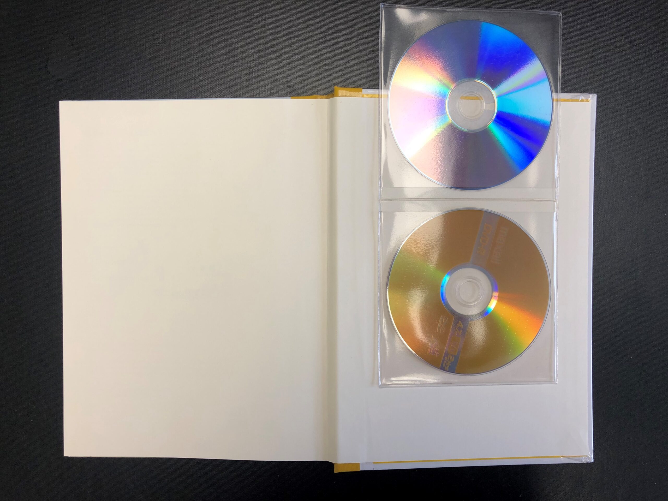 Pochette CD non autocollante transparente pour 1 à 2 CD  Les Reliures  Caron et Létourneau - Travaction - D.S.M.